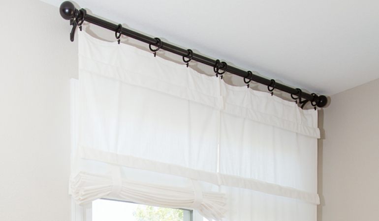 Tumble shades in Atlanta give your doors privacy versatility and style. White tumble shade on double glass doors